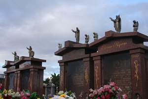 Graves with statues of Christ, Williamstown Cemetery
