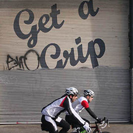 Cyclists and get a grip sign