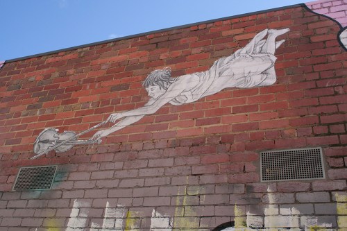 Flying violinist by Baby Guerrilla